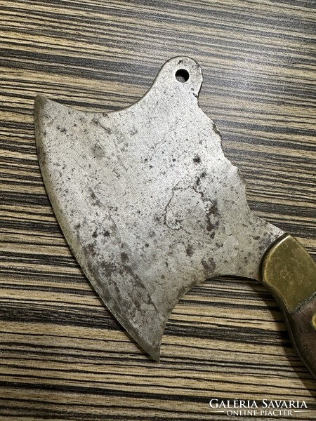 Old meat cleaver with brass and wooden handle