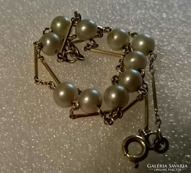 New! Two-row bracelet decorated with gold-plated pearls