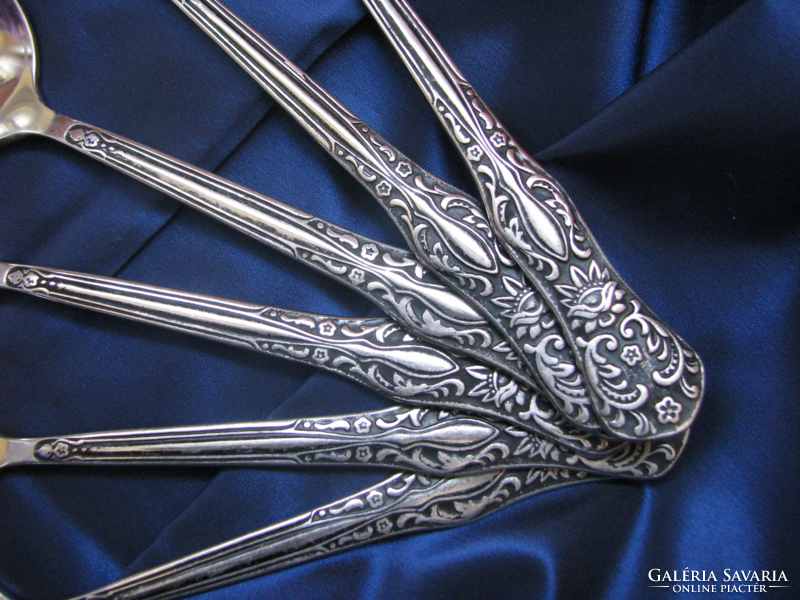 Set of antique Russian cutlery with a lotus flower pattern