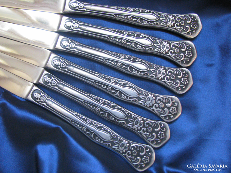 Set of antique Russian cutlery with a lotus flower pattern