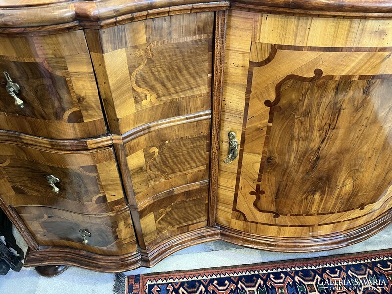 An antique chest of drawers in the Maria-Theresa style for sale