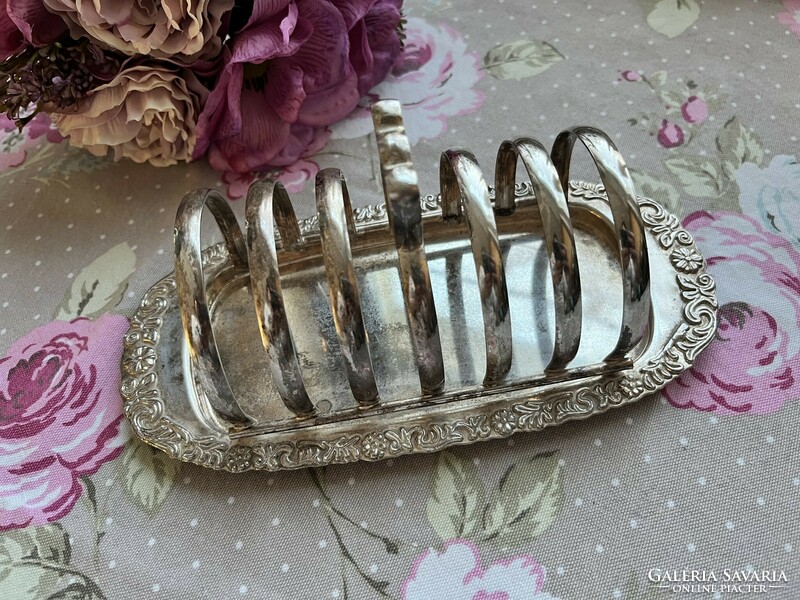 Very nice ornate old silver plated metal toast holder with base