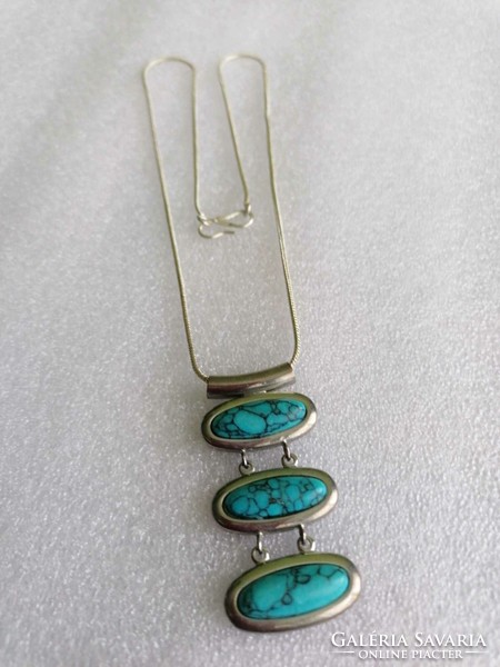 New! On a silver-plated necklace with a beautiful pendant with a unique mineral effect.