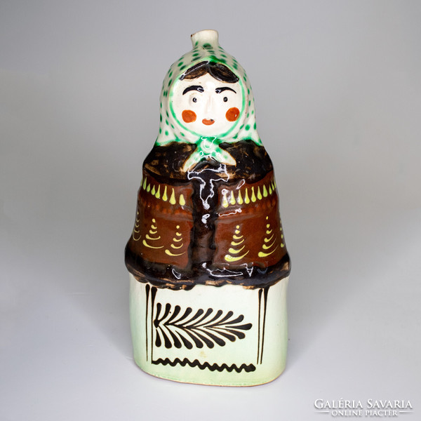 Ceramic bottle, female figure
