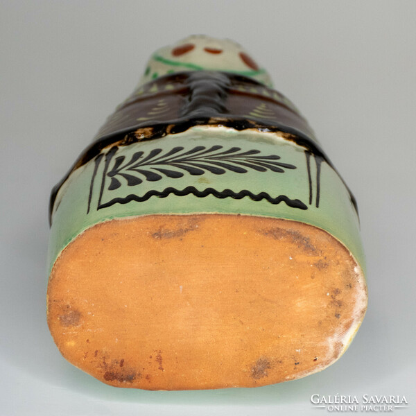 Ceramic bottle, female figure