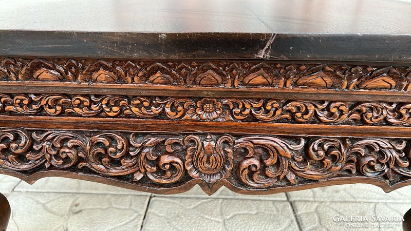 A wonderfully carved rectangular extra large tea table