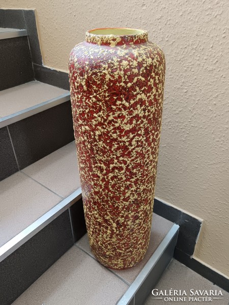 A giant floor vase of a lake head
