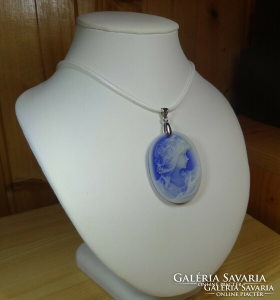 Wonderful cameo pendant carved with a beautiful profile, the color is not so bright.