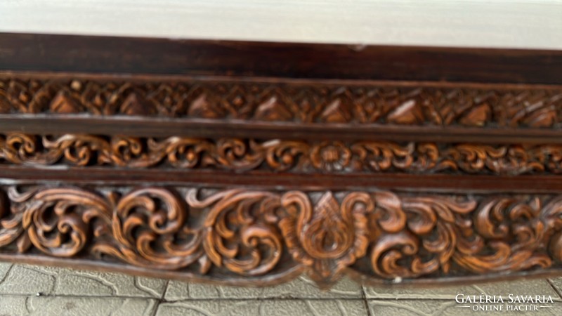 A wonderfully carved rectangular extra large tea table