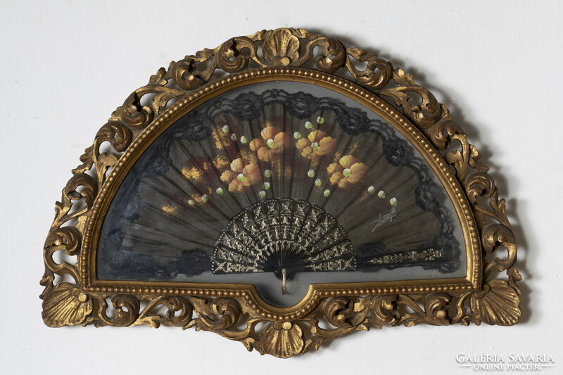 Old lace-edged bower in a carved decorative frame
