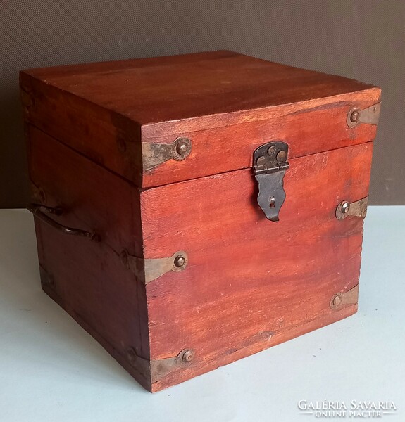 Wooden box with iron bars, negotiable design