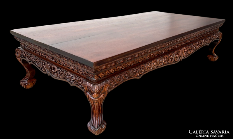 A wonderfully carved rectangular extra large tea table