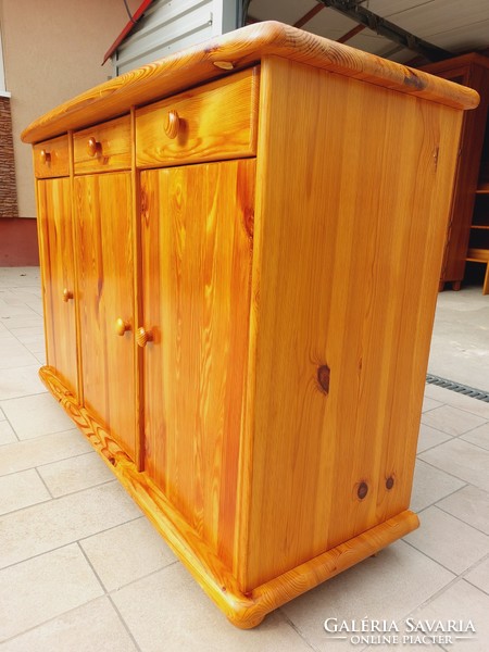 A pine dresser with 3 drawers and shelves is for sale. Furniture is in nice, new condition. Dimensions: 117 cm x 43 cm core