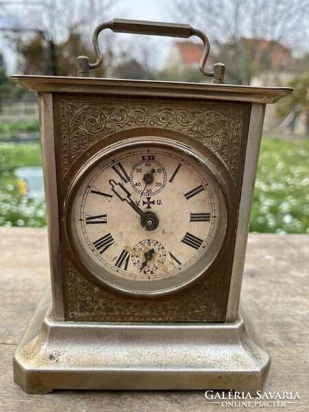 Travel clock with antique Junghaus structure