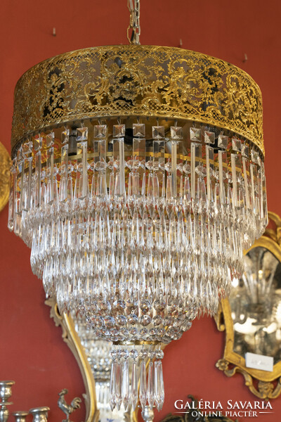 Crystal chandelier in the shape of a half bulb with an openwork frame