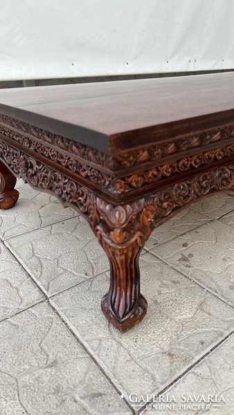 A wonderfully carved rectangular extra large tea table