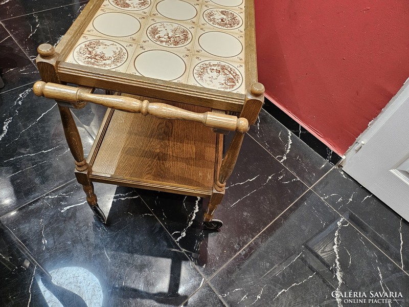 Old wooden cart with porcelain tiles