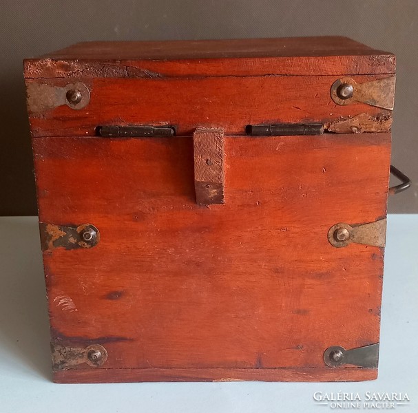 Wooden box with iron bars, negotiable design