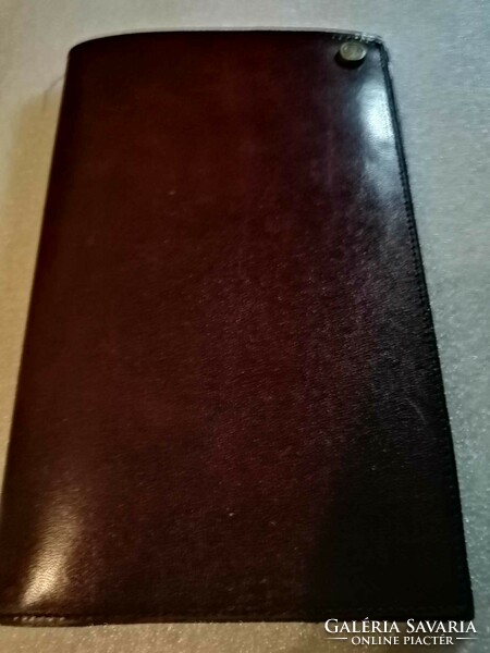 Old burgundy leather men's briefcase