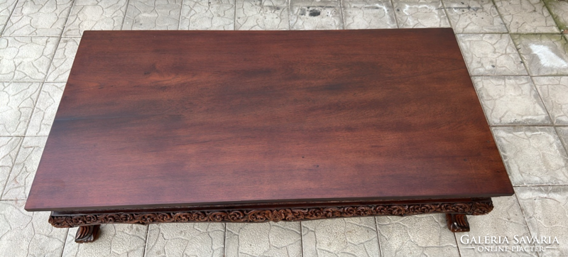 A wonderfully carved rectangular extra large tea table