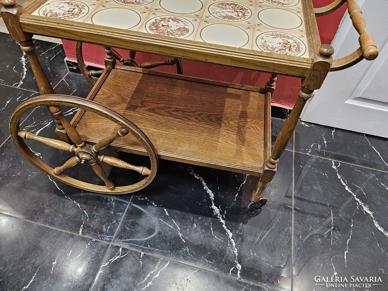 Old wooden cart with porcelain tiles