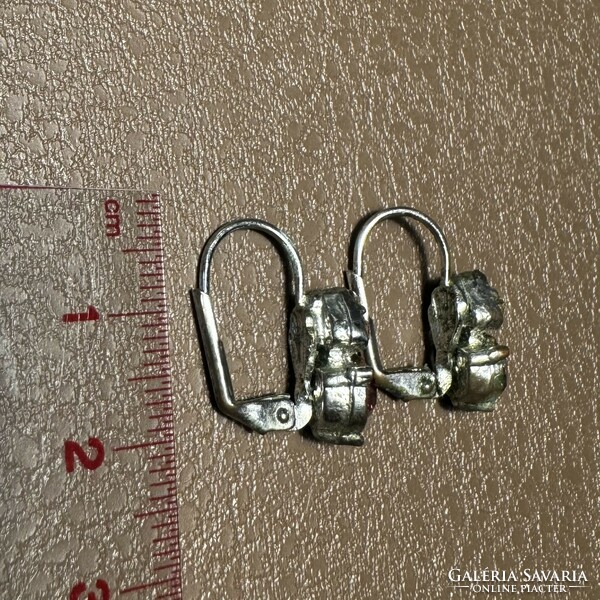 Old special vintage hook earrings, metal earrings, the jewelry is from the 1970s