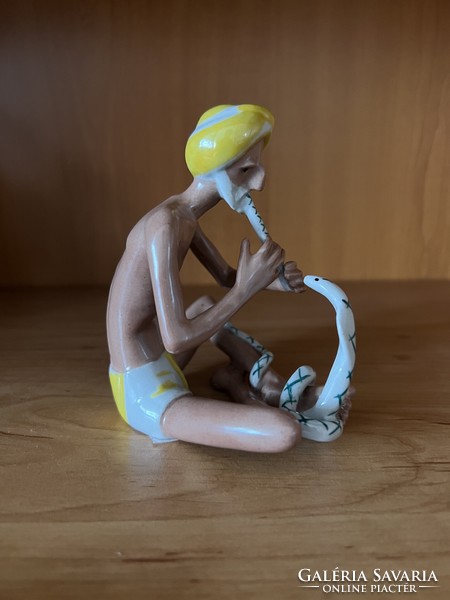 Snake charmer figure