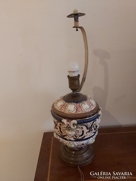 Antique majolica table lamp with turned wooden base and parchment shade