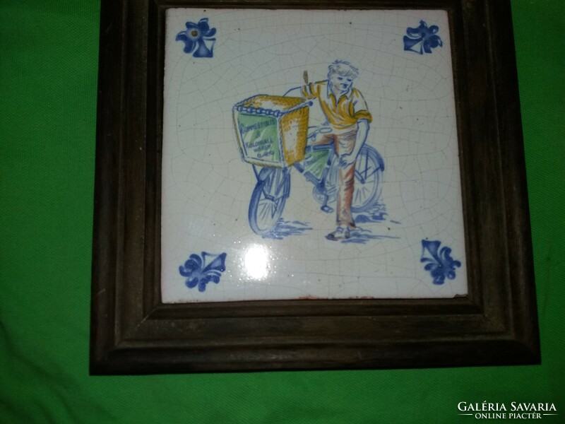 Memorial tile of the Dutch de swaen (swan) ceramic and porcelain factory in a wall decoration frame according to the pictures
