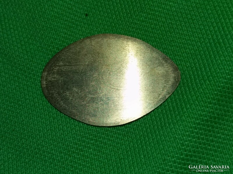 Small rare metal oval commemorative coin of old scrap metal according to the pictures