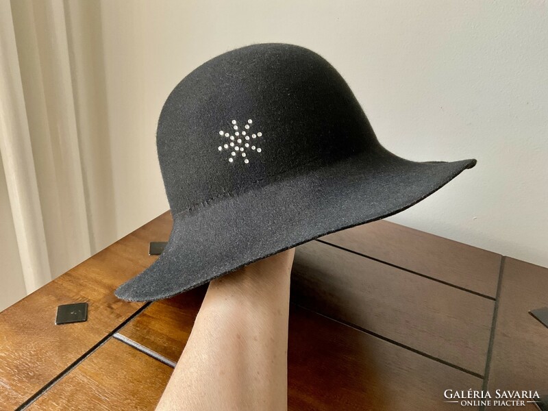 Special black women's hat decorated with rhinestones