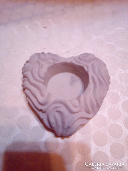 Heart-shaped candle holder. New