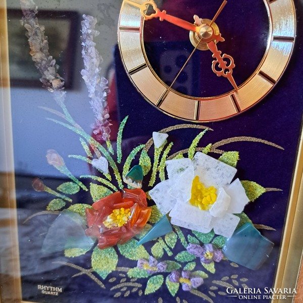 Wall clock decorated with stones