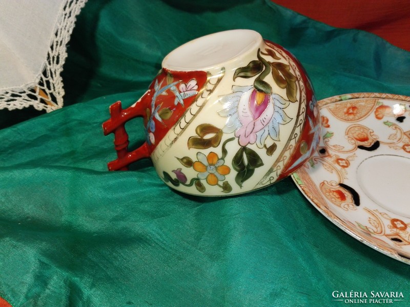 Old, hand-painted porcelain tea cup.....Oriental.
