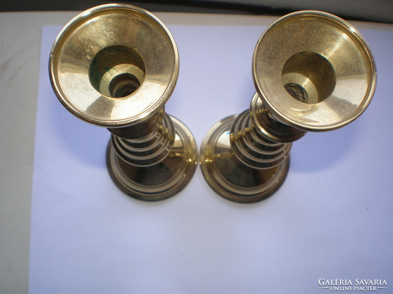 Brass cast candle holders in new condition, 17.5 cm high, base diam. 6.5 cm