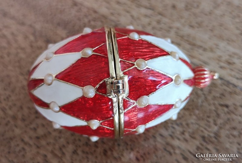 Red and white enameled openable metal egg