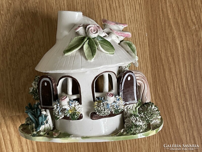 A very beautiful, meticulously crafted porcelain elf house.