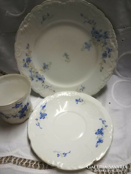 Old porcelain coffee set with breakfast plates