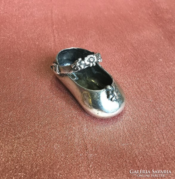 Silver miniature shoes