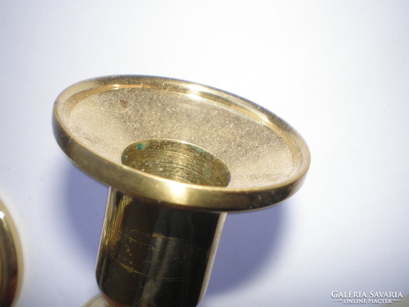 Brass cast candle holders in new condition, 17.5 cm high, base diam. 6.5 cm