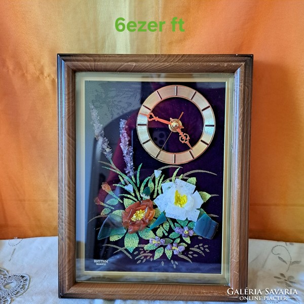 Wall clock decorated with stones