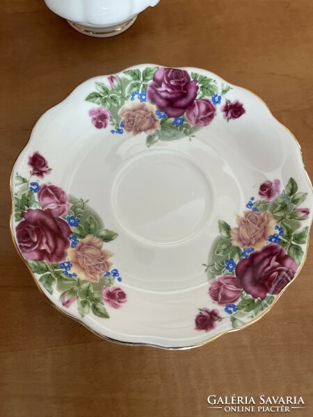 A dreamy English rose tea cup with small plate.
