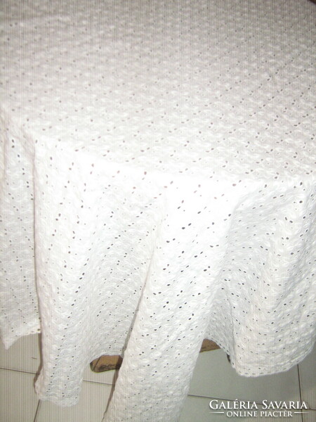 Beautiful snow-white elegant madeira tablecloth