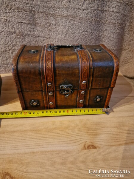 Ancient jewelry wooden box with antique lock