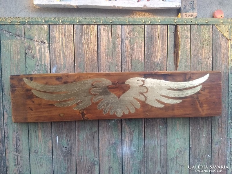Antique effect wall decoration with angel wings, wall plaque