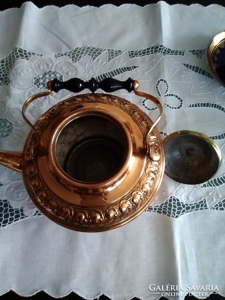 Old copper teapot with hammered pattern with wooden tongs, beautiful design!