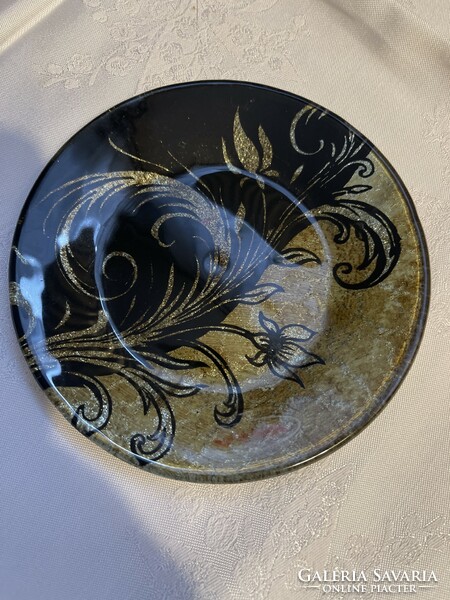 Richly gilded glass decorative plate.