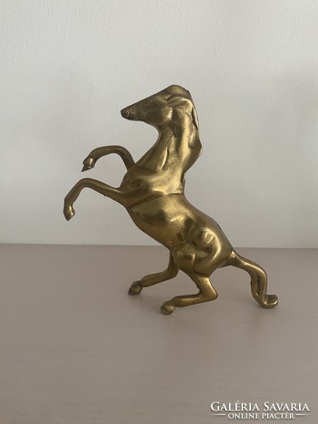 Copper prancing horse statue
