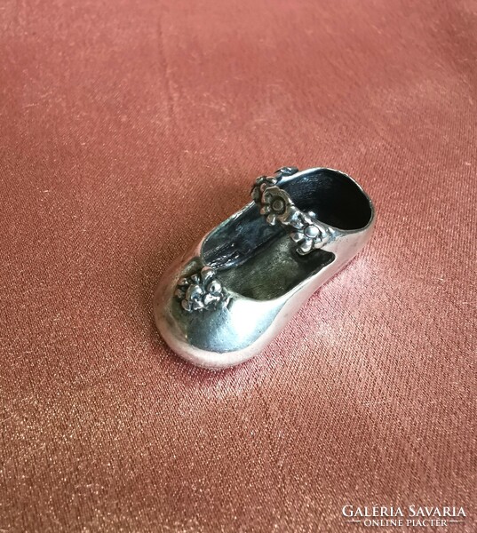 Silver miniature shoes