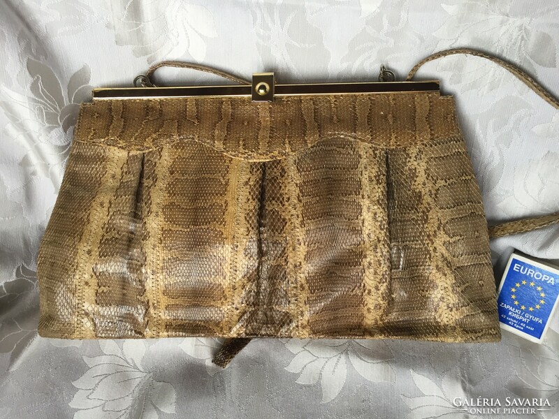 Old, retro, vintage snakeskin reticle, women's bag for theater, film props, but also for photography